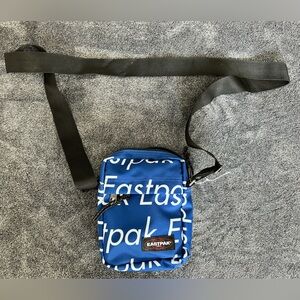 Eastpak The One Crossbody Travel Bag Purse Pouch Pack, Blue w/Logo